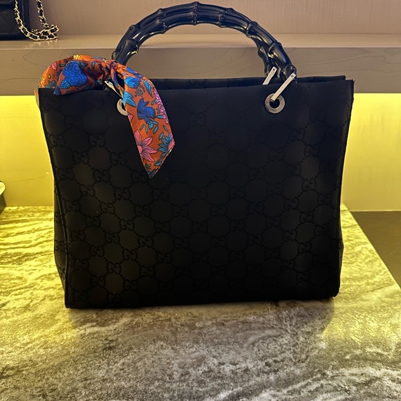 Gucci Handbags - Bamboo Gucci tote bag.Spot in interior that could be cleaned out, light rubbing